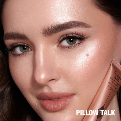Charlotte Tilbury 
Mini Beauty Highlighter Wand..color PILLOW TALK
