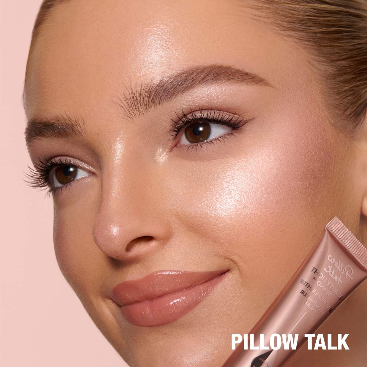 Charlotte Tilbury 
Mini Beauty Highlighter Wand..color PILLOW TALK